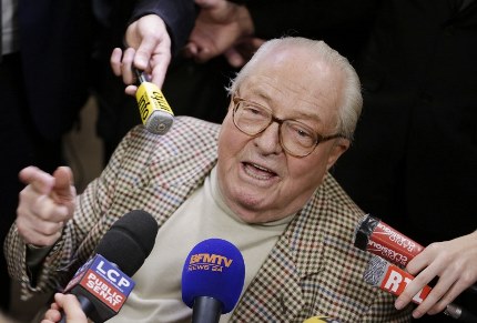 French far-right Front National (FN) party honorary president Jean-Marie Le Pen speaks to journalists following the anouncement of results for the first round of the French departementales elections on March 22, 2015 in Nanterre. AFP PHOTO / KENZO TRIBOUILLARD