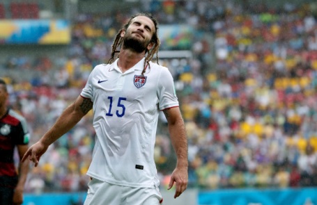 United States' Kyle Beckerman closes his eyes during the group G World Cup soccer match between the USA and Germany at the Arena Pernambuco in Recife, Brazil, Thursday, June 26, 2014. (AP Photo/Matthias Schrader)