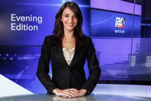 Lucy Aharish anchoring the news. Photo by Kfir Ziv Photography