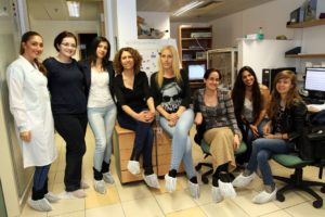 Prof. Mouna Maroun, fourth from left, with her lab group. Photo courtesy of the University of Haifa 